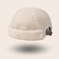 Bonnet docker Mouton retourné ivoire, packshot vue de profil