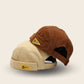 Bonnets docker Believe marron et beige superposés