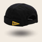 Bonnet docker Believe coloris noir, vue de trois quarts arrière