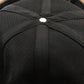 Gros plan sur les coutures du bonnet docker Bicolore noir