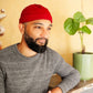 Bonnet docker Breton Rayé rouge porté par un homme, portrait