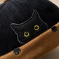Gros plan sur la matière du bonnet docker Chat noir & camel