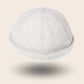 Bonnet docker Effet Laine blanc, texture bouclette, vue de face