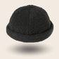 Bonnet docker Effet Laine noir, texture bouclette, vue de face