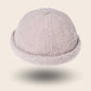 Bonnet docker Effet Laine rose poudré, texture bouclette, vue de face