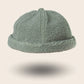 Bonnet docker Effet Laine vert sauge, texture bouclette, vue de face