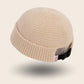 Bonnet docker Grosse Maille écru, texture tricot épais, vue de trois quarts arrière