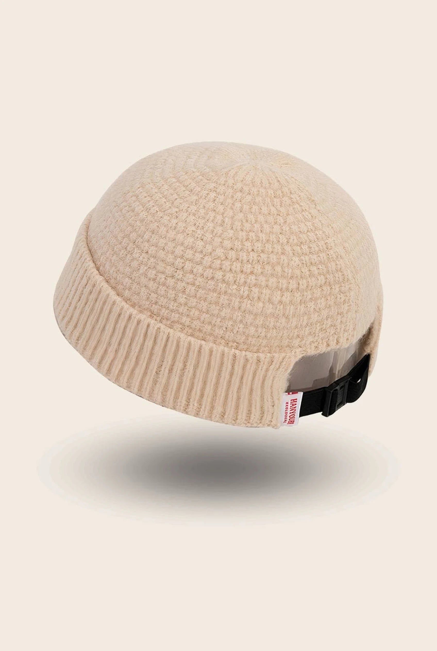 Bonnet docker Grosse Maille écru, texture tricot épais, vue de trois quarts arrière
