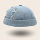Bonnet docker en Jean bleu clair effet délavé et déchiré, vue de face