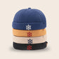 Bonnets docker Marin empilés en 4 coloris avec gouvernail brodé