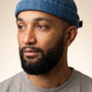 Bonnet docker Miki Jeans porté par un homme, portrait