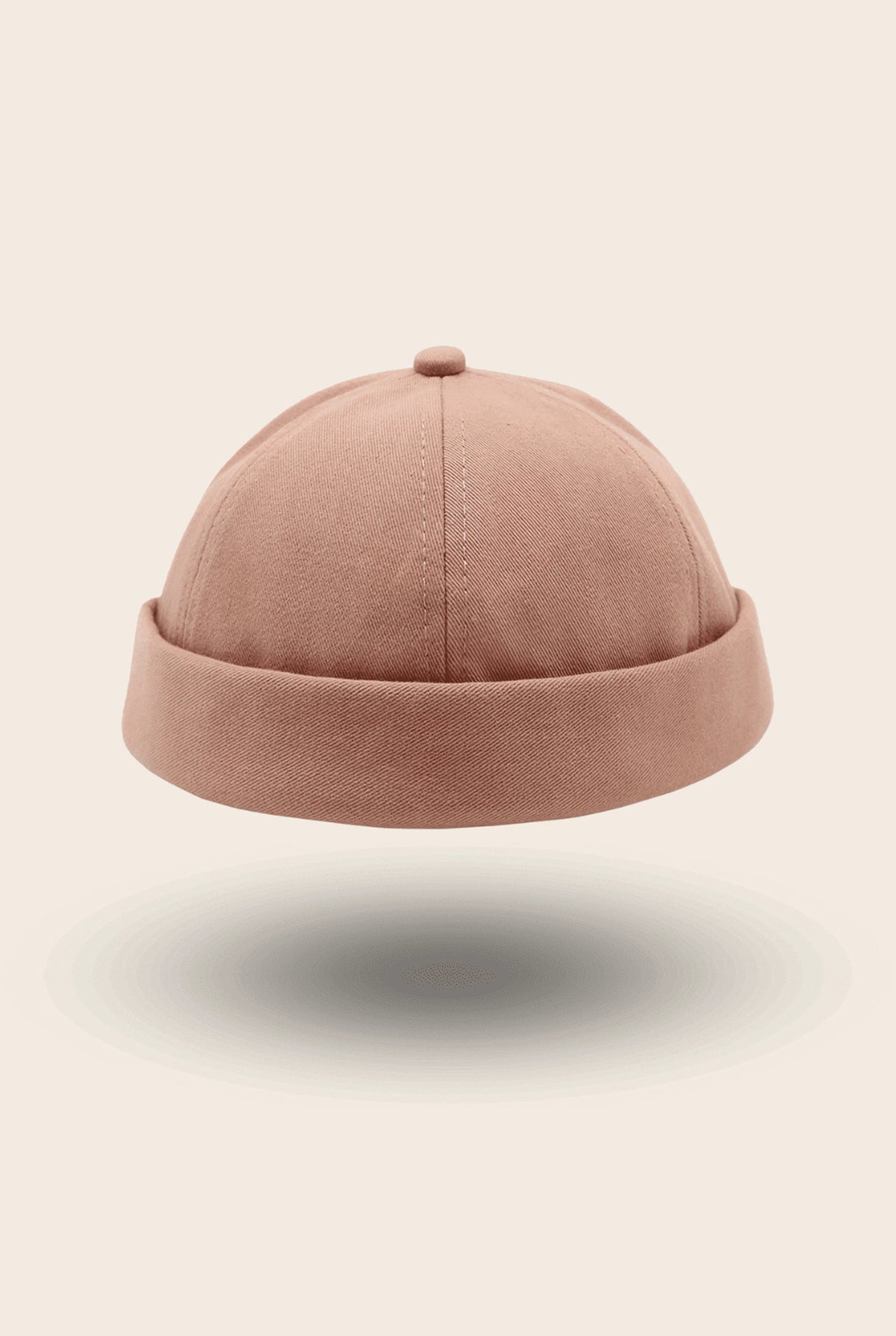 Bonnet docker uni rose poudré, vue de profil